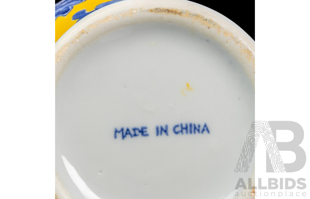 Pair of Unmatched Chinese Ceramic Vases