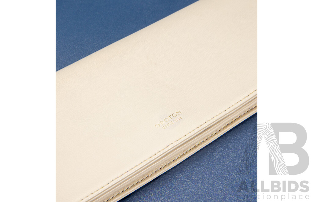 Crème Atlantic Slim Clutch Purse – by Oroton