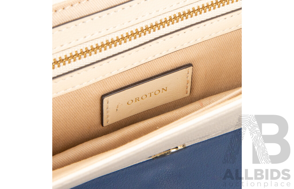 Crème Atlantic Slim Clutch Purse – by Oroton
