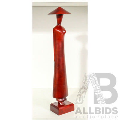 Hand-Carved Wooden Figure of Woman Wearing Conical Hat