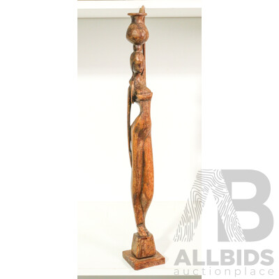 Hand-Carved Wooden Figure of Woman Carrying a Vessel