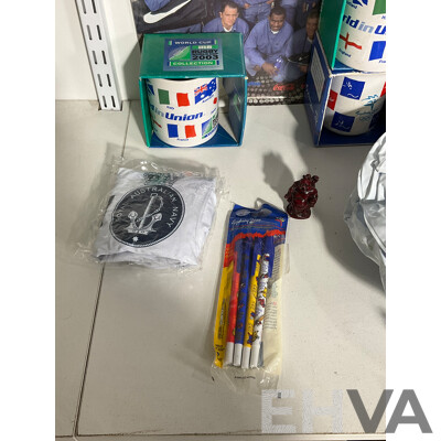 Collection of Sporting Goods Including Four 2003 Rugby World Cup Inflatable Footballs, Two Boxed Mugs, Boxed Sydney 2000 Mug and Pen Set, Twenty Five Olympic Poster Cards, 1996 Canberra Raiders Poster