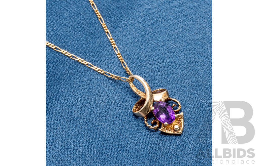 9ct Yellow Gold Oval Amethyst Pendant and Chain - 3.05gms