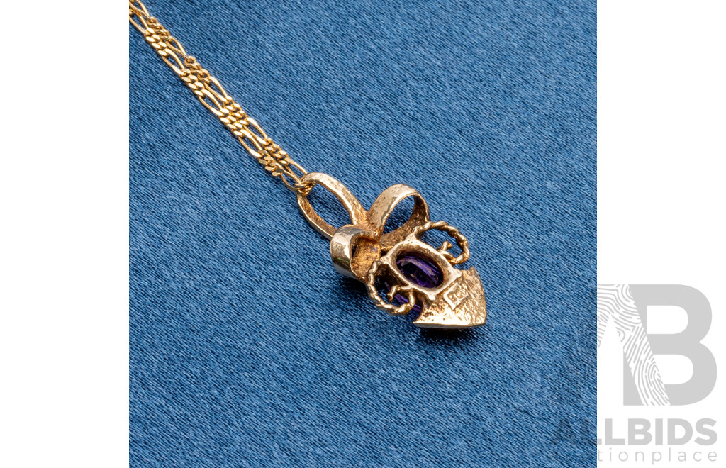 9ct Yellow Gold Oval Amethyst Pendant and Chain - 3.05gms