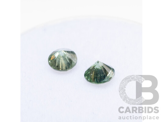 1660575 · Pair of Round Brilliant Cut Green Diamonds - 0.60cts