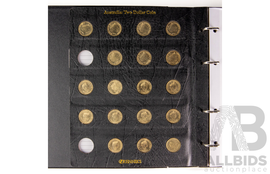 Australian Renniks Two Dollar Coin Album Containing Fifty Nine Coins Including 2013 QE2 Coronation, 2018 Armistice, 2016 Olympics Set, 2019 Police Remembrance 2020 Firefighters 2021 Ambulance Service................