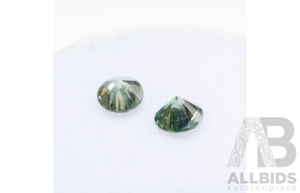 Pair of Round Brilliant Cut Green Diamonds - 0.60cts