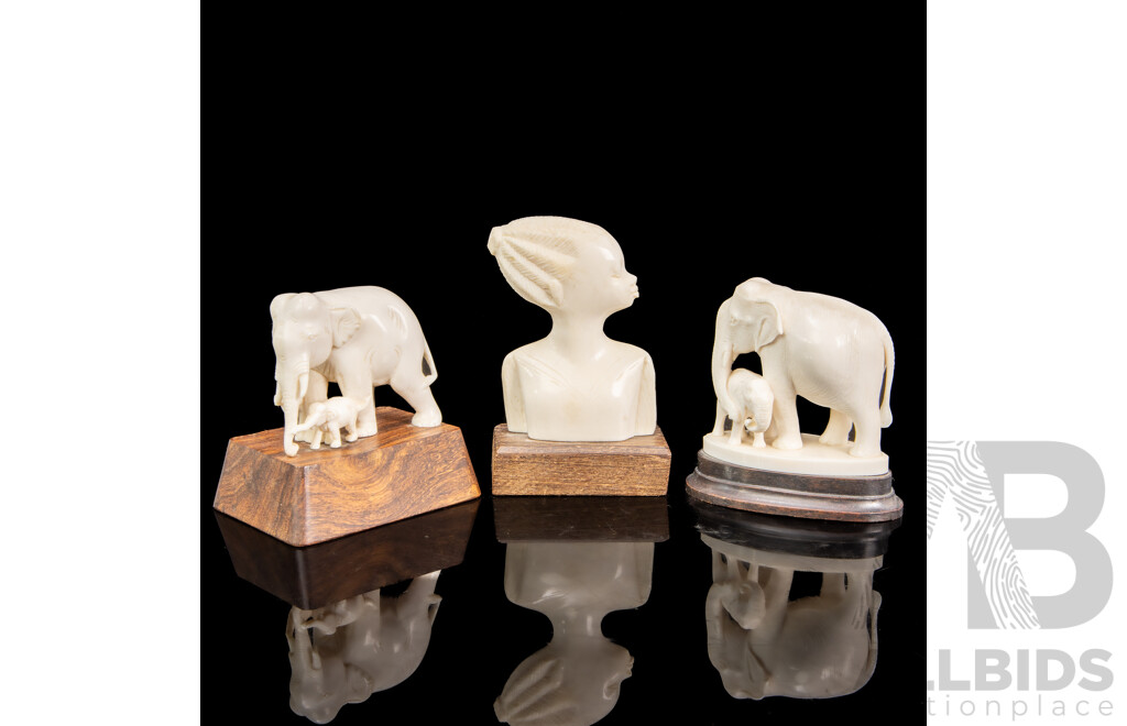 Collection of Three Bone Carvings Including Elephants and Female Figure