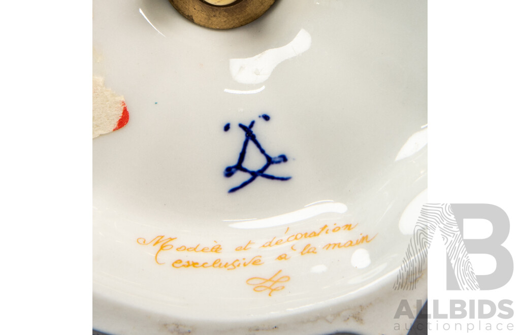 Pair of Graduated Giulia Mangani Porcelain Candlesticks