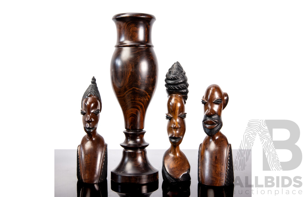 Collection of Three Carved Hardwood African Busts and a Turned Candle Stick
