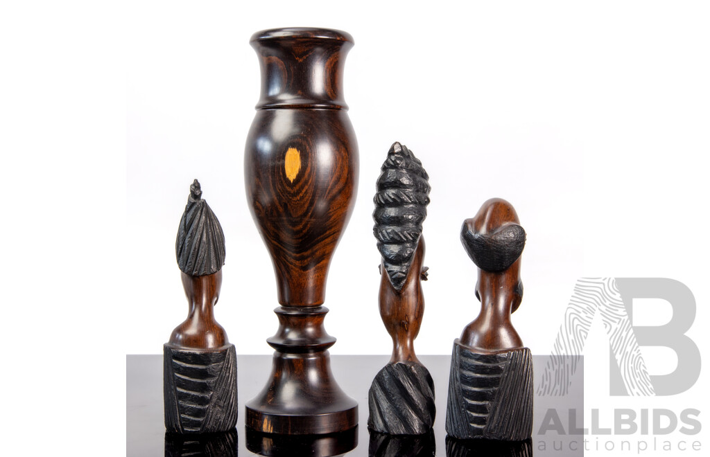 Collection of Three Carved Hardwood African Busts and a Turned Candle Stick