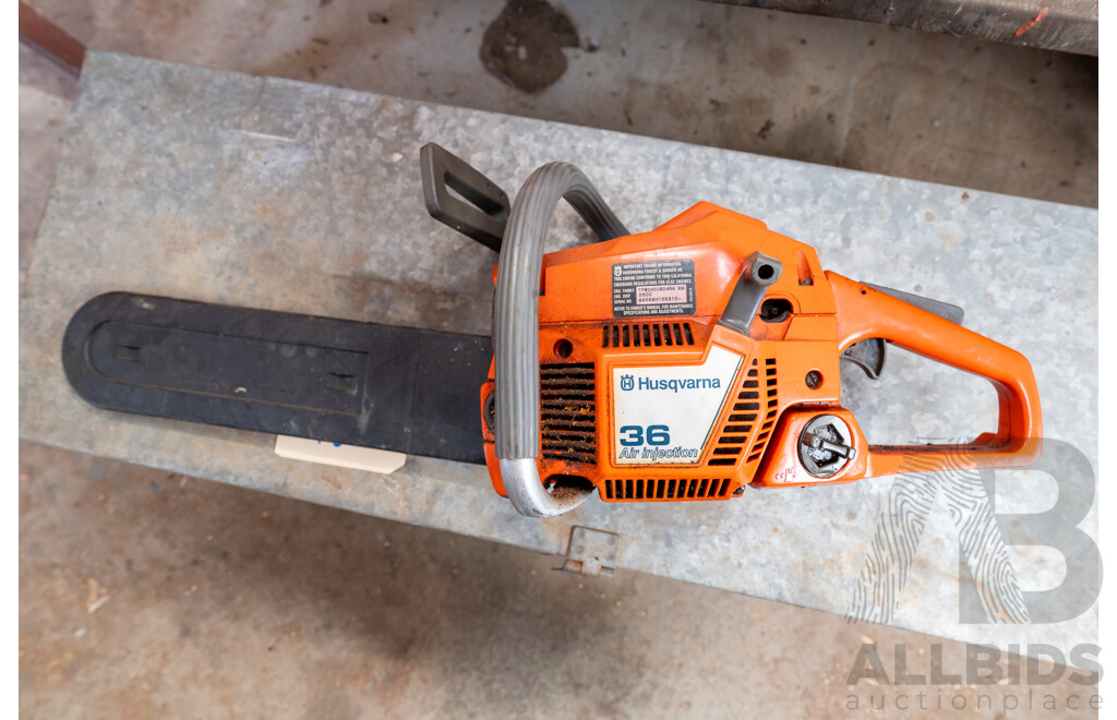 Husqvarna 36cc Chainsaw with Poulan Pro Chainsaw