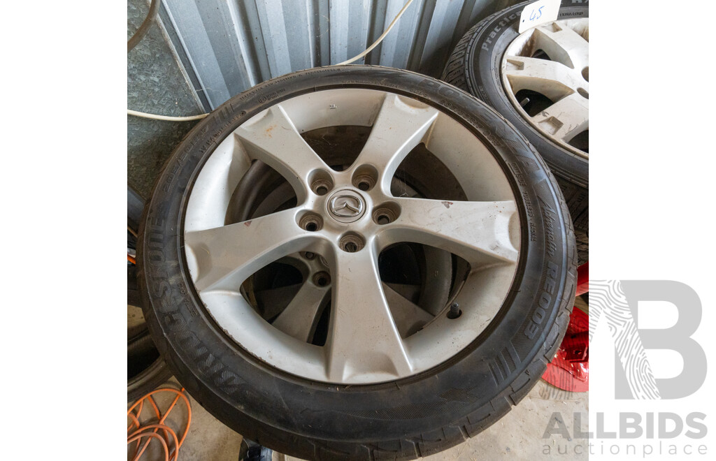 Set of Four 17 Inch Mazda Wheels 55114.3
