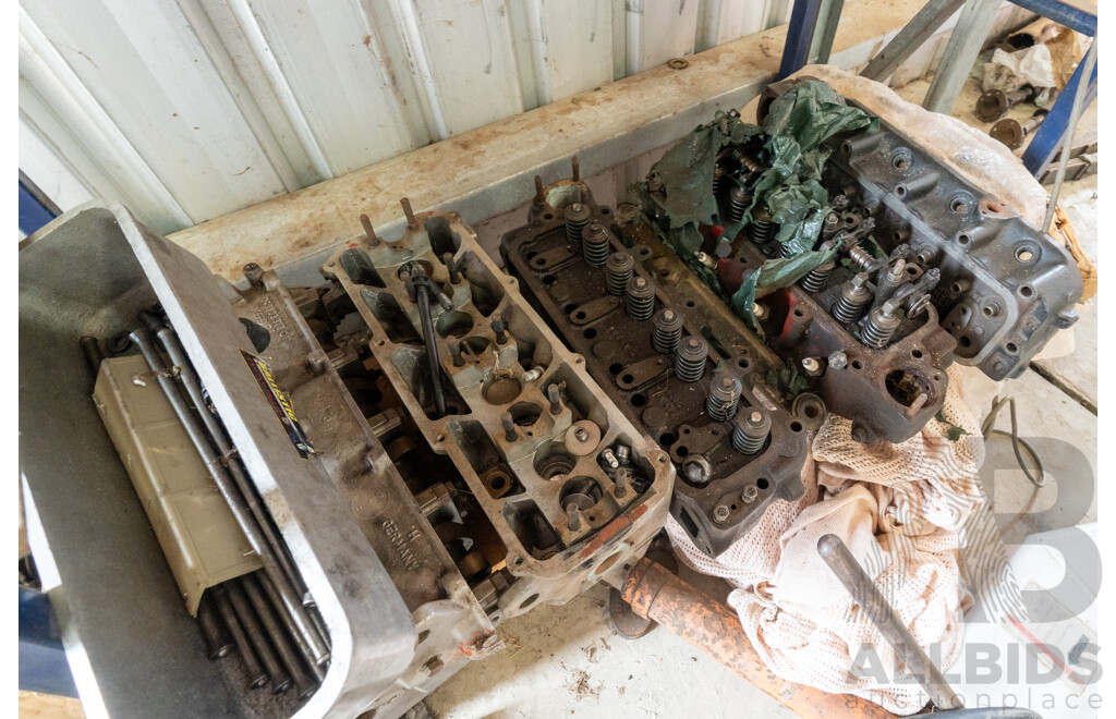 Collection of Five Assorted Engine Cylinder Heads