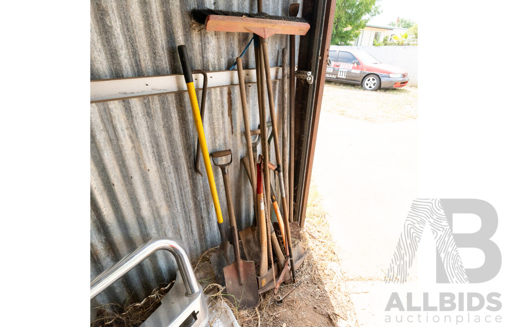 Assorted Lot of Garden Tools in Shovels, Axes, Pick Axe and More