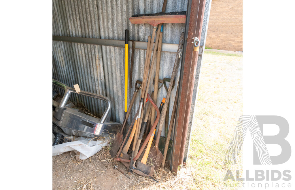 Assorted Lot of Garden Tools in Shovels, Axes, Pick Axe and More