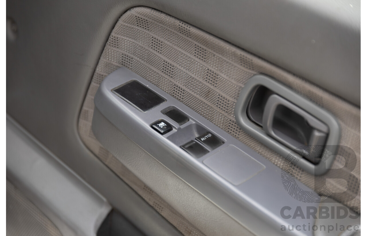 5/2013 Nissan Navara DX (4x2) D22 SERIES 5 C/Chas Polar White Turbo Diesel 2.5L