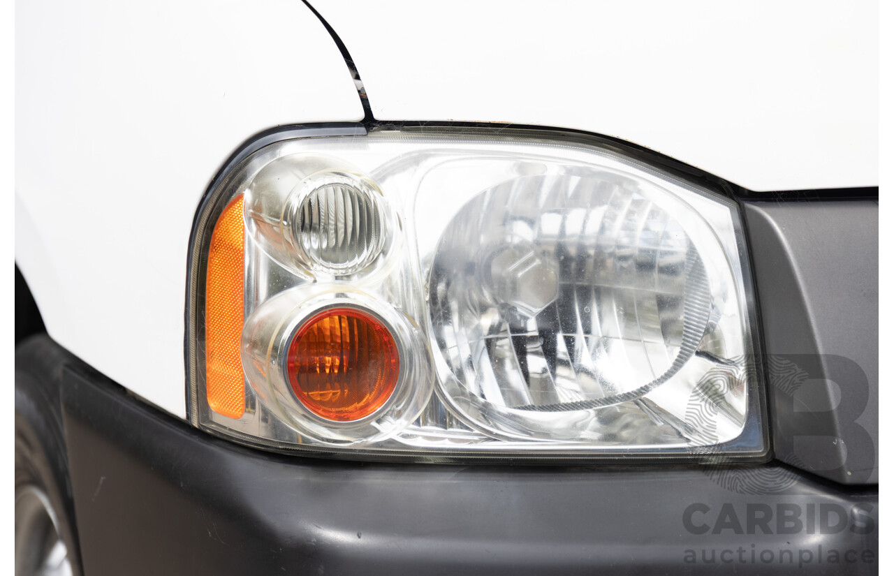 5/2013 Nissan Navara DX (4x2) D22 SERIES 5 C/Chas Polar White Turbo Diesel 2.5L