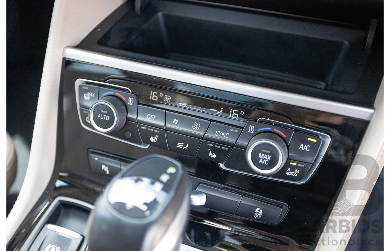 6/2015 BMW 225i Active Tourer Sport Line FWD F45 4D Wagon Black Sapphire Metallic Turbo 2.0L