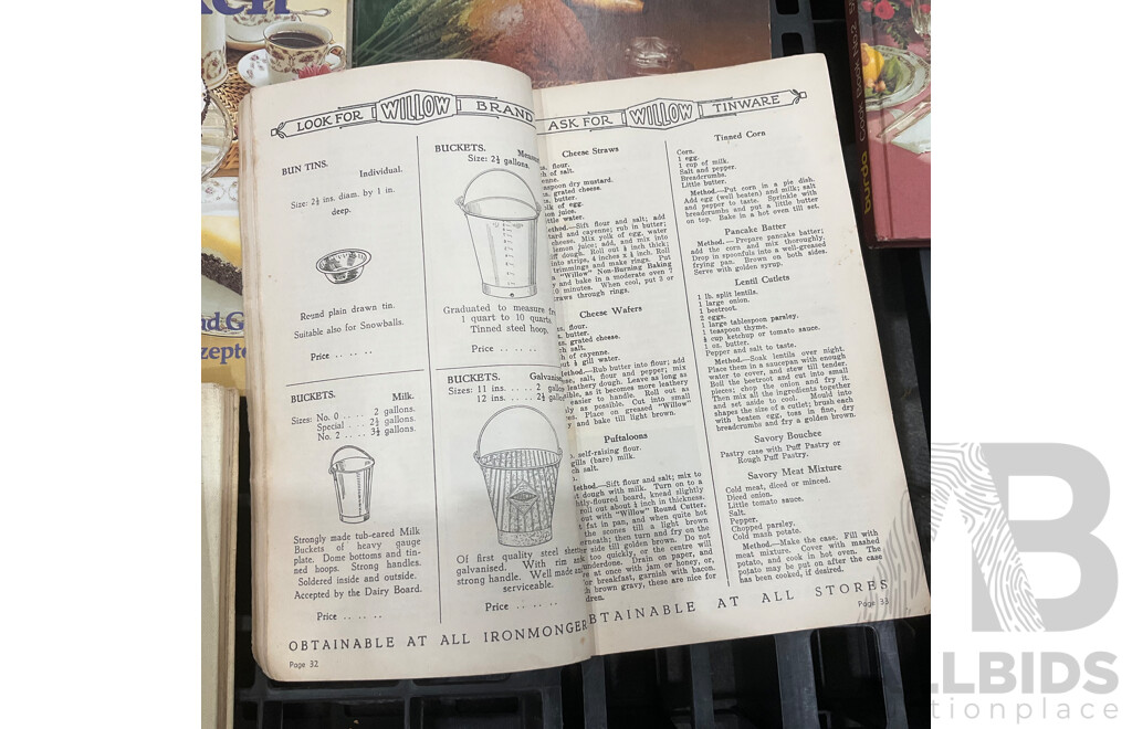 Collection of Vintage Cookbooks Spanning Various Cuisines and Baking Styles