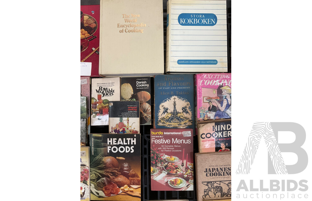 Collection of Vintage Cookbooks Spanning Various Cuisines and Baking Styles