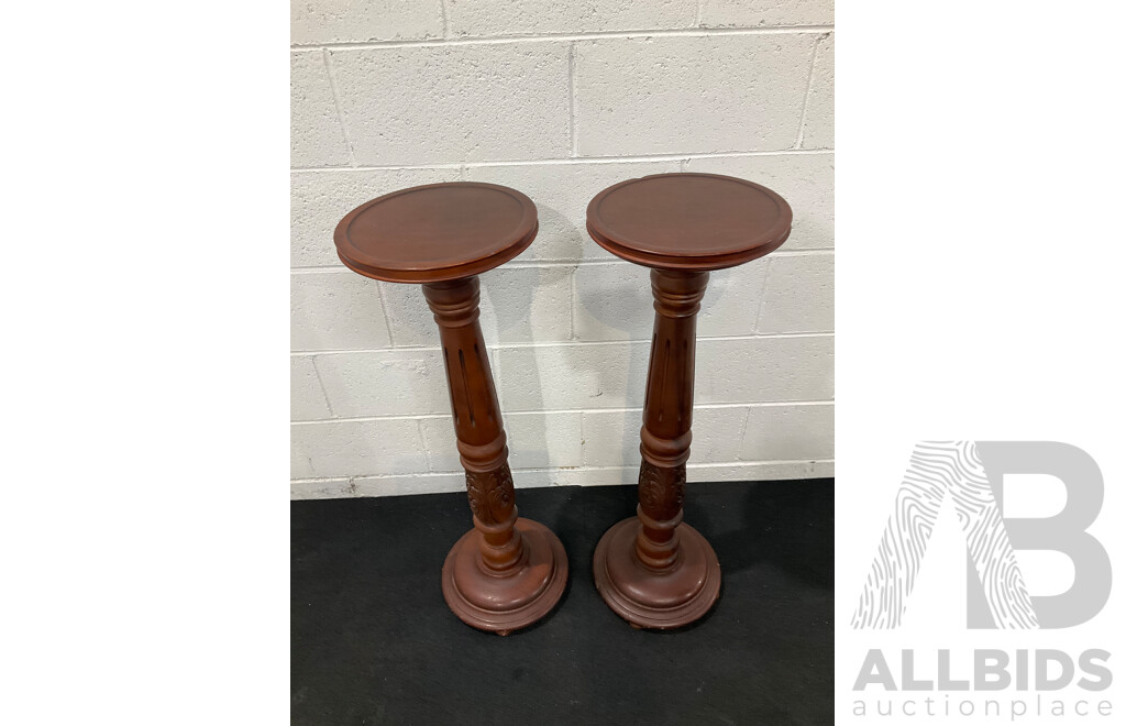Pair of Turned and Carved Mahogany Pedestals