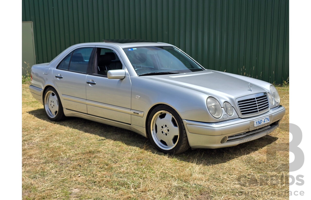 10/1998 Mercedes Benz E55 AMG W210 4d Sedan Brilliant Silver Metallic V8 5.4L