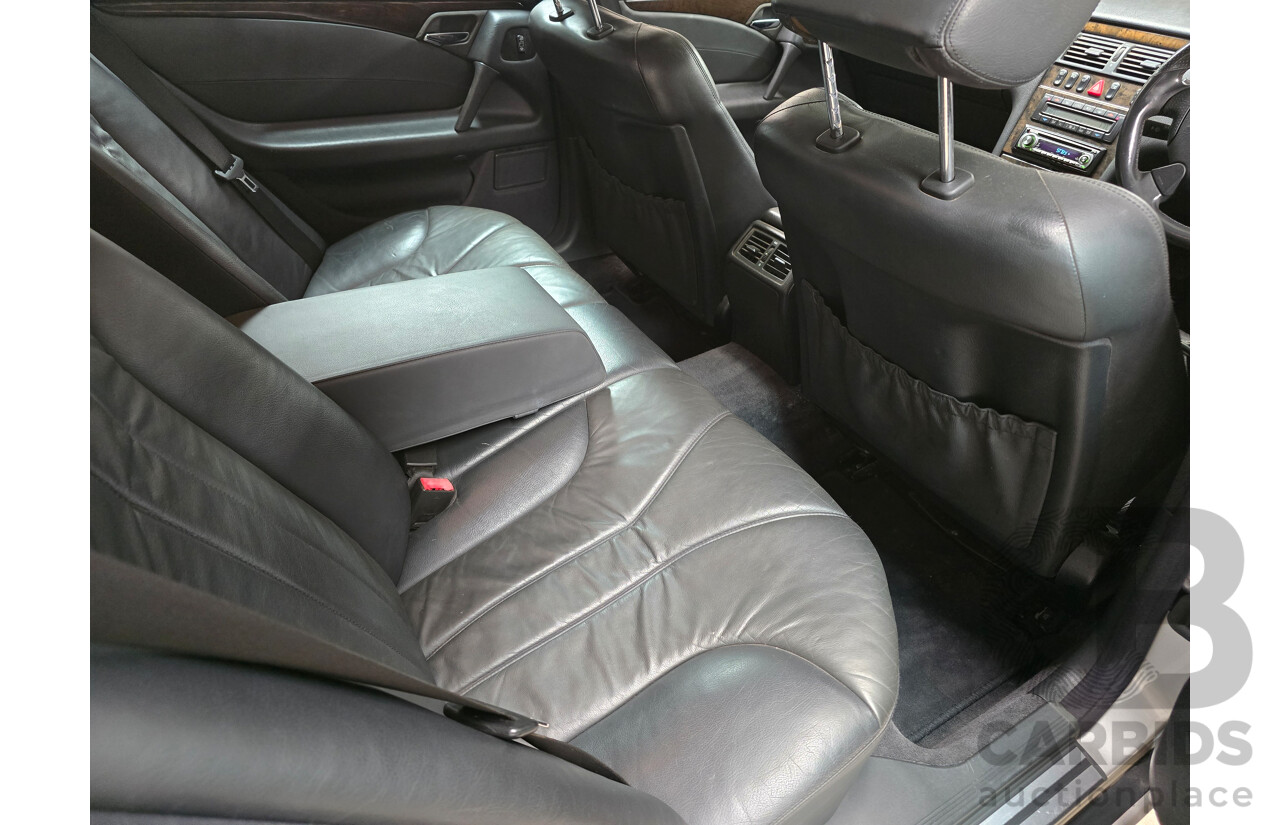 10/1998 Mercedes Benz E55 AMG W210 4d Sedan Brilliant Silver Metallic V8 5.4L