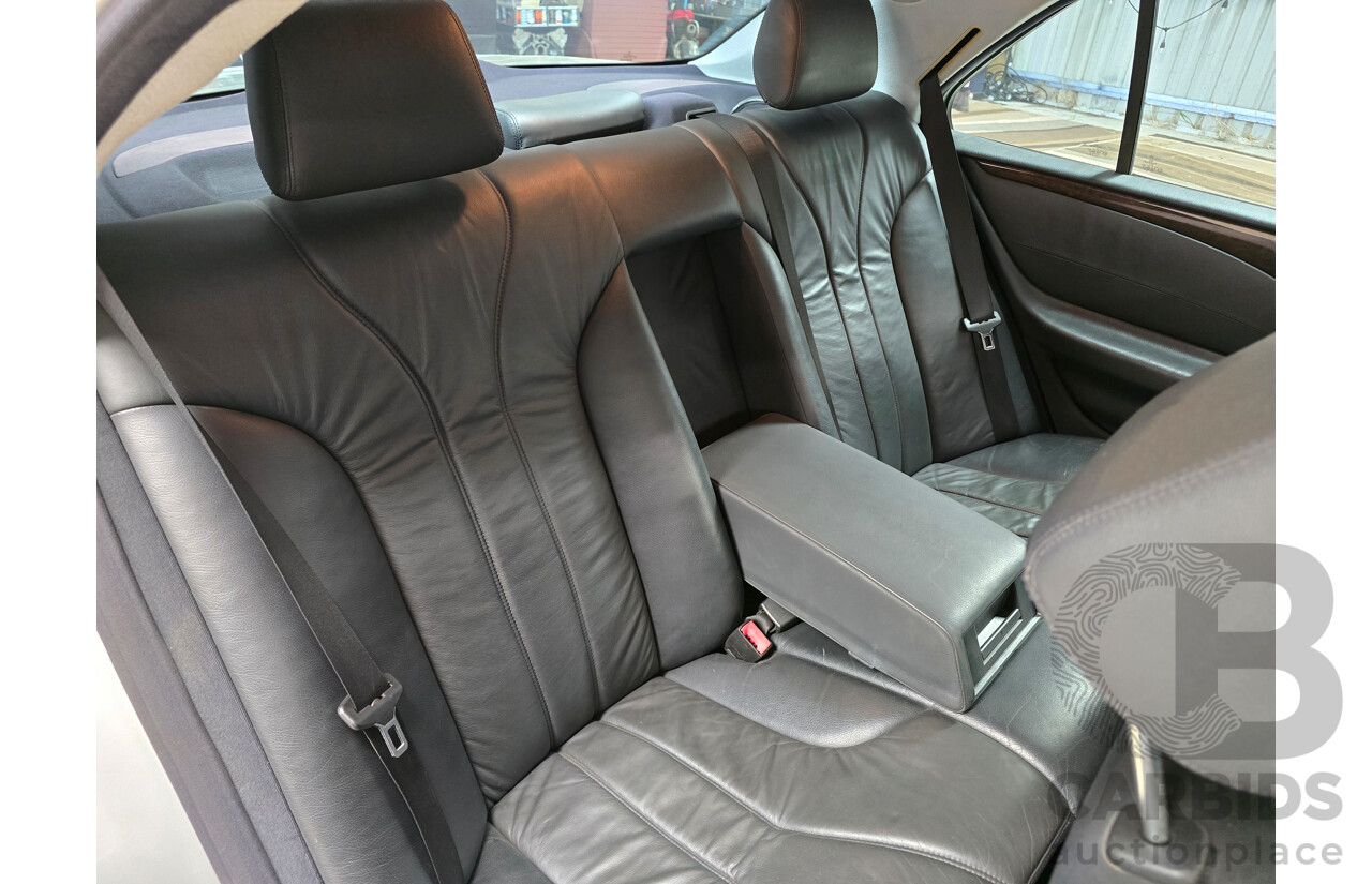 10/1998 Mercedes Benz E55 AMG W210 4d Sedan Brilliant Silver Metallic V8 5.4L