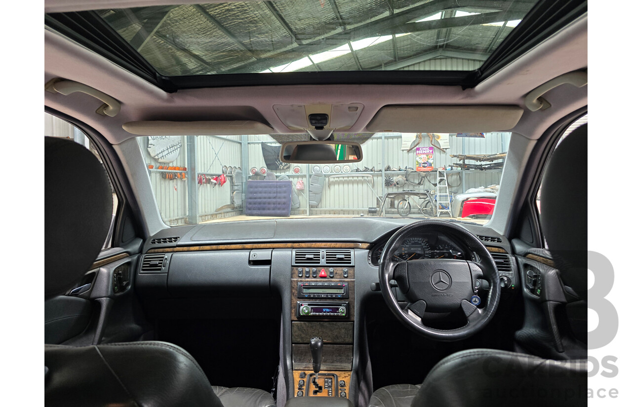 10/1998 Mercedes Benz E55 AMG W210 4d Sedan Brilliant Silver Metallic V8 5.4L