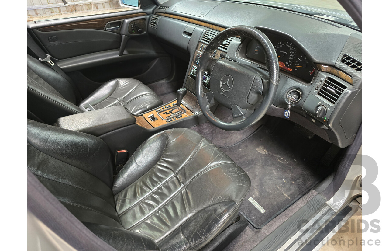 10/1998 Mercedes Benz E55 AMG W210 4d Sedan Brilliant Silver Metallic V8 5.4L