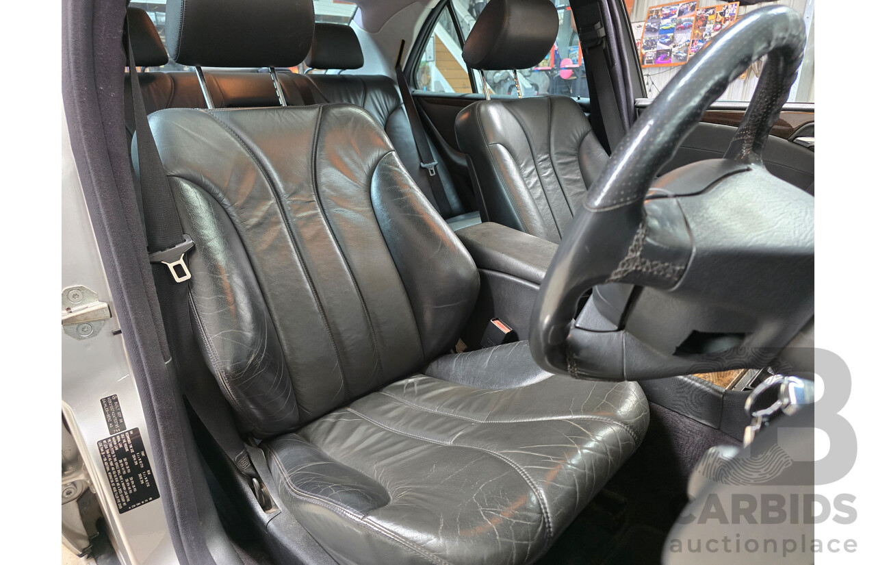 10/1998 Mercedes Benz E55 AMG W210 4d Sedan Brilliant Silver Metallic V8 5.4L