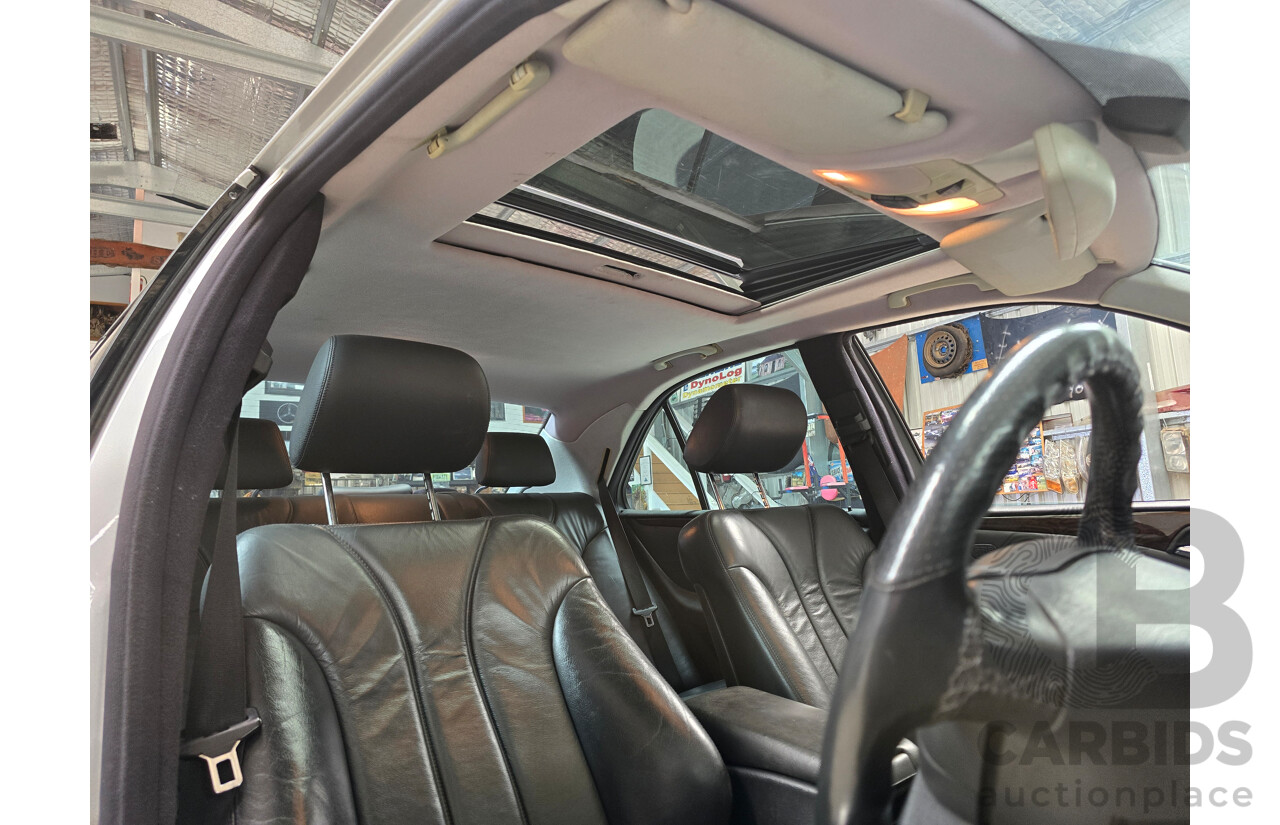 10/1998 Mercedes Benz E55 AMG W210 4d Sedan Brilliant Silver Metallic V8 5.4L