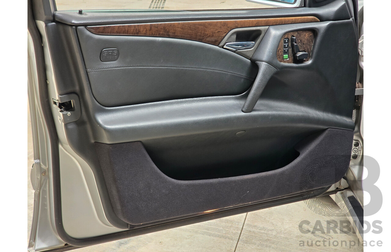 10/1998 Mercedes Benz E55 AMG W210 4d Sedan Brilliant Silver Metallic V8 5.4L