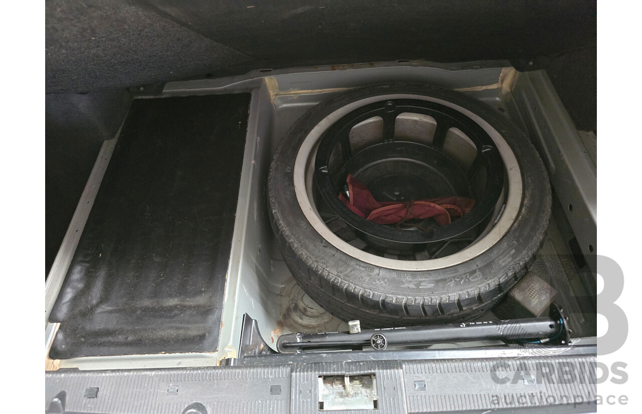 10/1998 Mercedes Benz E55 AMG W210 4d Sedan Brilliant Silver Metallic V8 5.4L