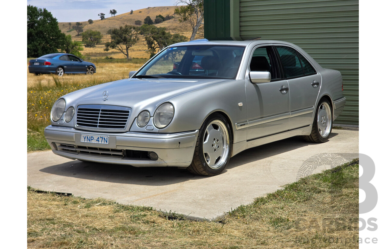 10/1998 Mercedes Benz E55 AMG W210 4d Sedan Brilliant Silver Metallic V8 5.4L