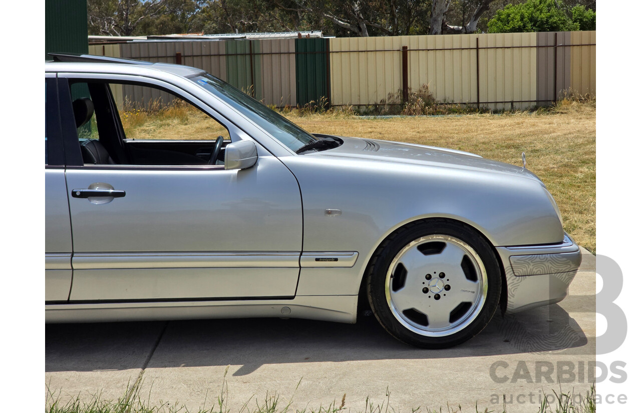10/1998 Mercedes Benz E55 AMG W210 4d Sedan Brilliant Silver Metallic V8 5.4L