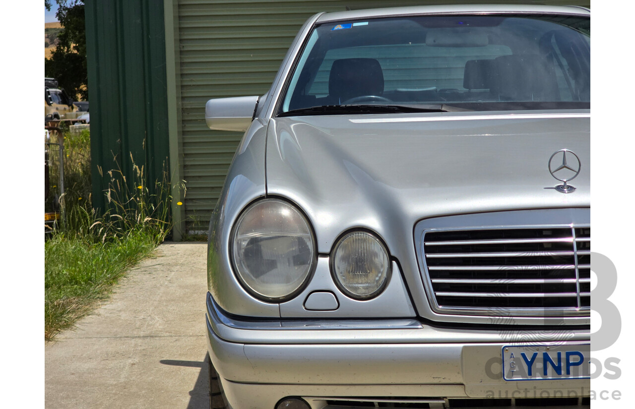 10/1998 Mercedes Benz E55 AMG W210 4d Sedan Brilliant Silver Metallic V8 5.4L