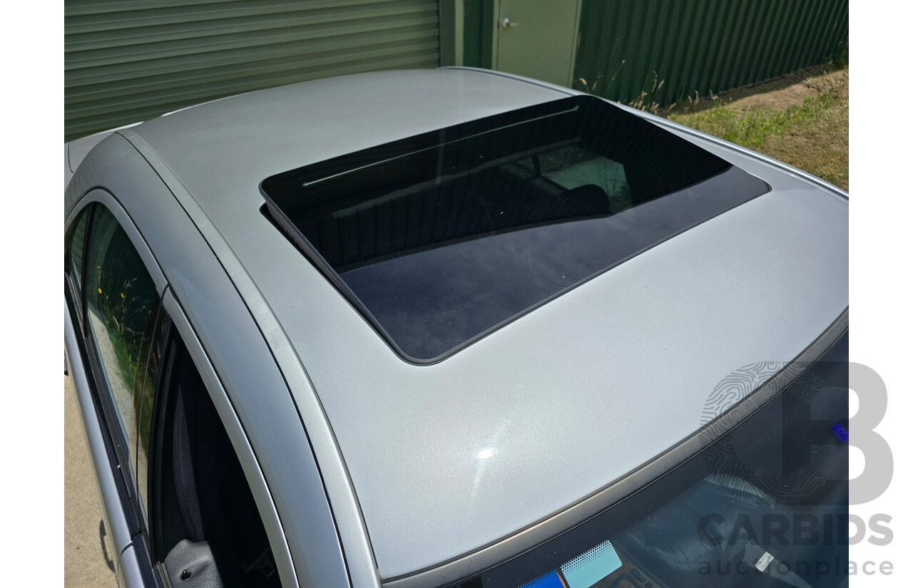 10/1998 Mercedes Benz E55 AMG W210 4d Sedan Brilliant Silver Metallic V8 5.4L