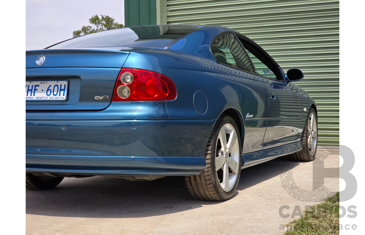 9/2003 Holden Monaro CV8 V2 Series III 2d Coupe Barbados Metallic Blue V8 5.7L