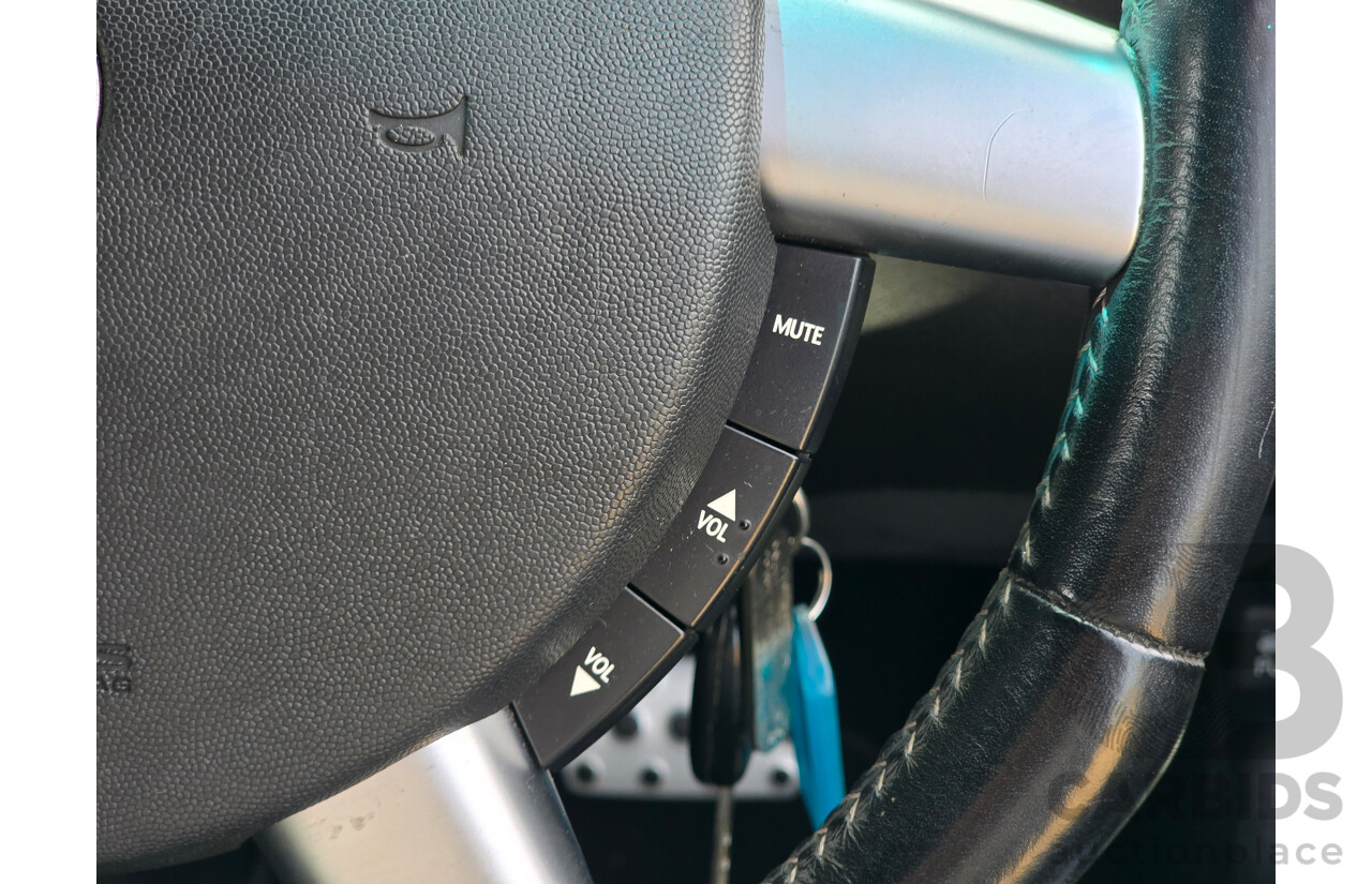 9/2003 Holden Monaro CV8 V2 Series III 2d Coupe Barbados Metallic Blue V8 5.7L