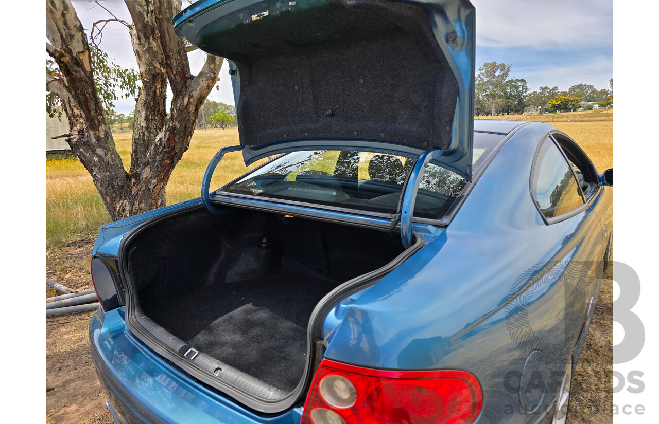 9/2003 Holden Monaro CV8 V2 Series III 2d Coupe Barbados Metallic Blue V8 5.7L