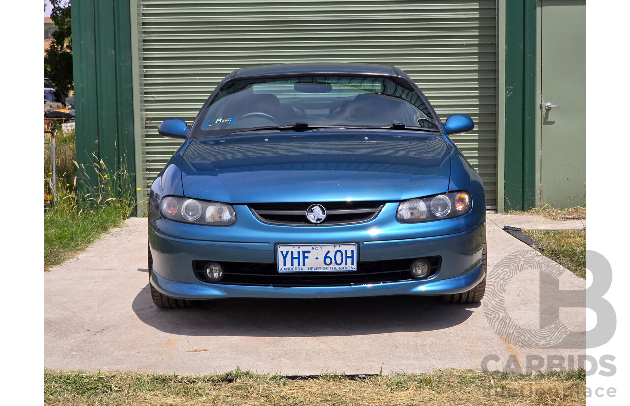 9/2003 Holden Monaro CV8 V2 Series III 2d Coupe Barbados Metallic Blue V8 5.7L