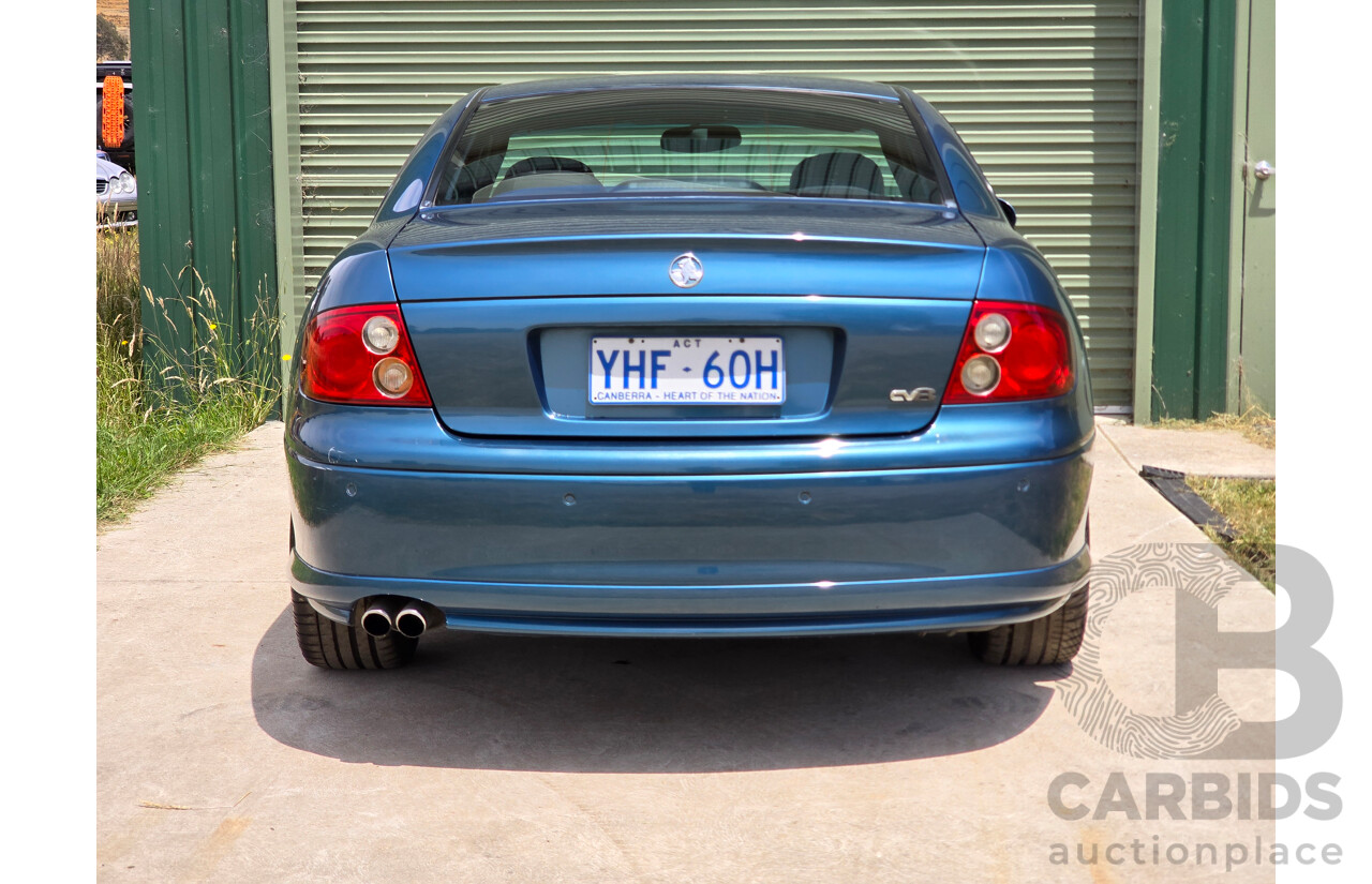 9/2003 Holden Monaro CV8 V2 Series III 2d Coupe Barbados Metallic Blue V8 5.7L