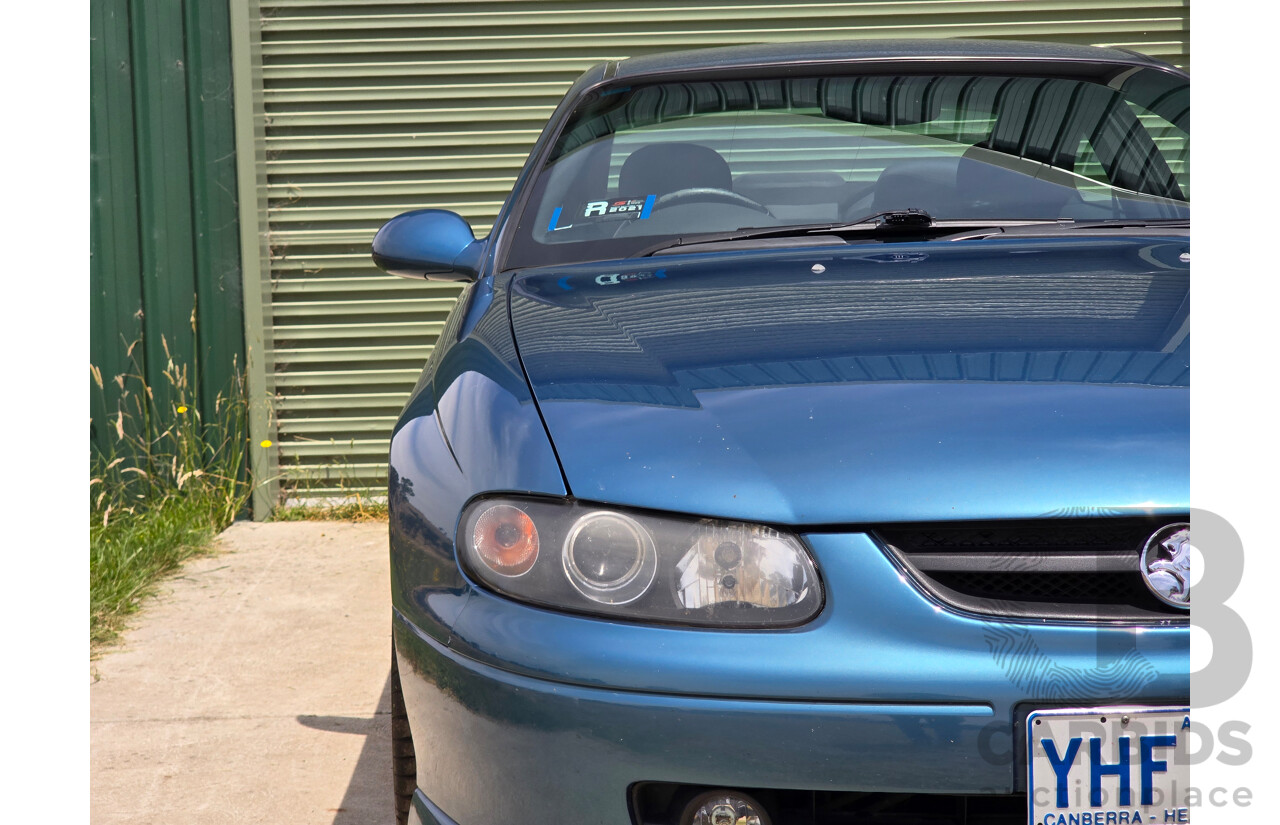 9/2003 Holden Monaro CV8 V2 Series III 2d Coupe Barbados Metallic Blue V8 5.7L