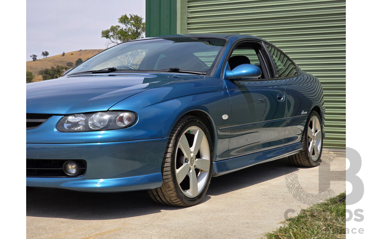 9/2003 Holden Monaro CV8 V2 Series III 2d Coupe Barbados Metallic Blue V8 5.7L