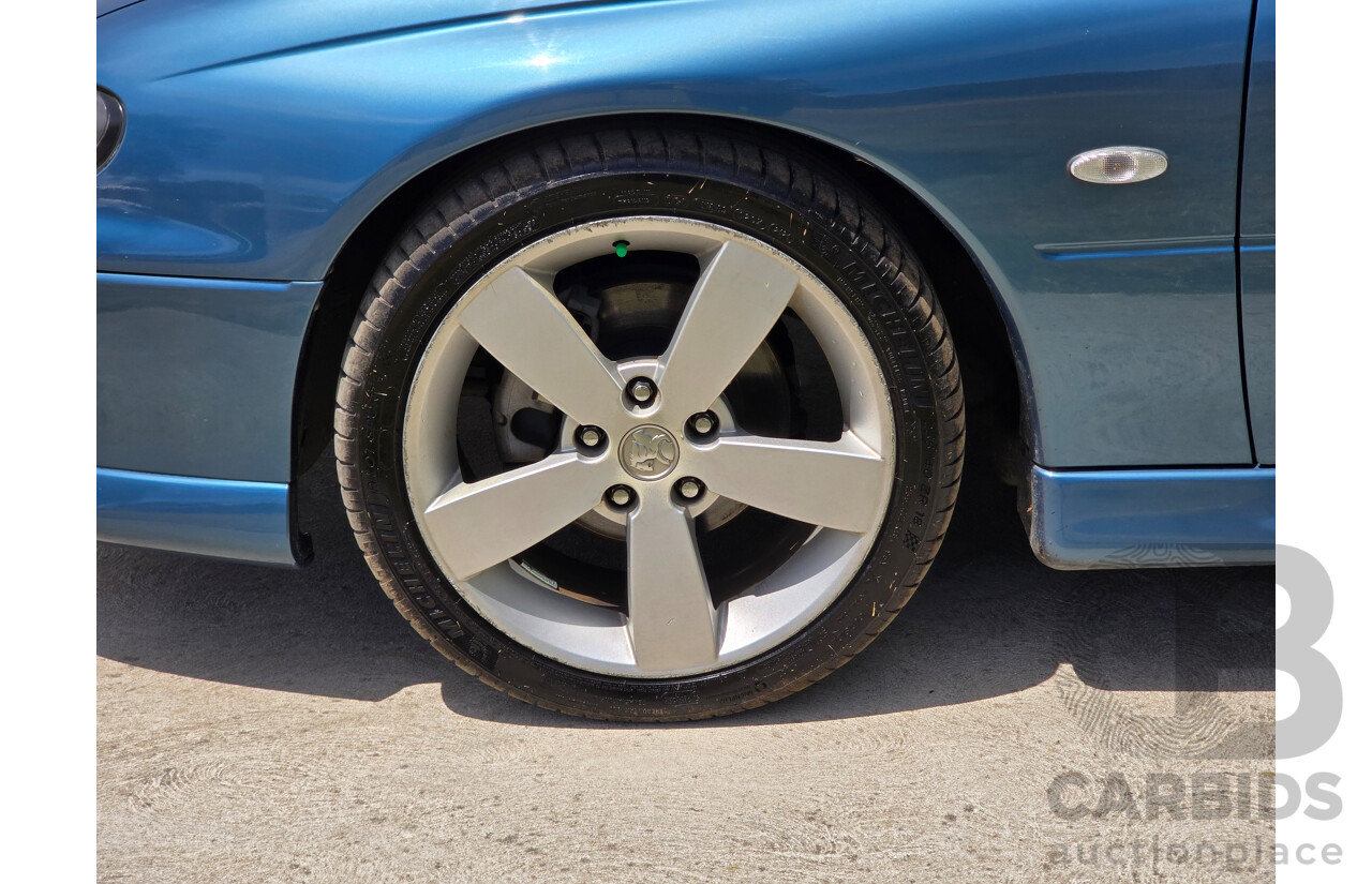 9/2003 Holden Monaro CV8 V2 Series III 2d Coupe Barbados Metallic Blue V8 5.7L