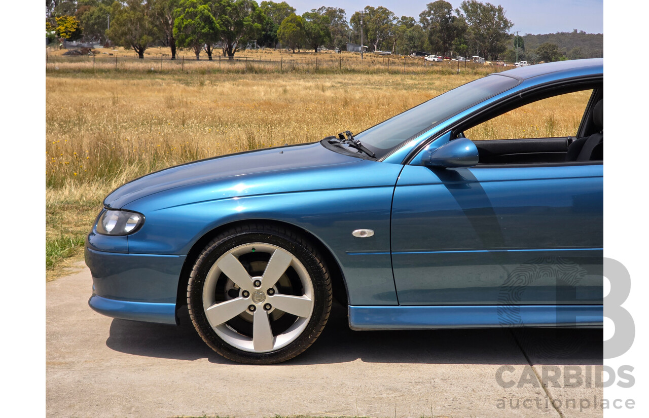 9/2003 Holden Monaro CV8 V2 Series III 2d Coupe Barbados Metallic Blue V8 5.7L