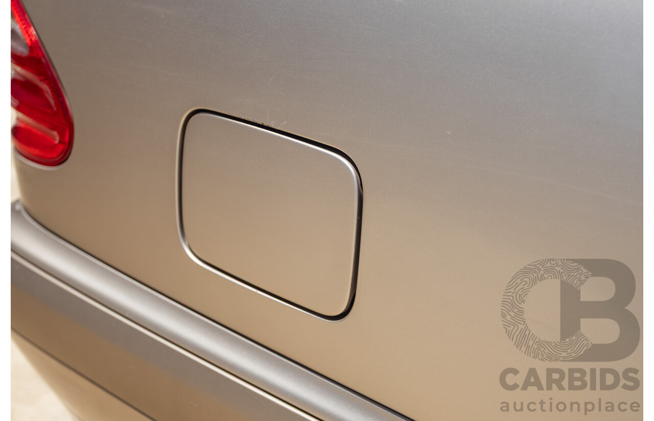 6/2002 Mercedes Benz E240 Classic W210 4d Wagon Travertine Beige Metallic V6 2.4L - 7 Seater