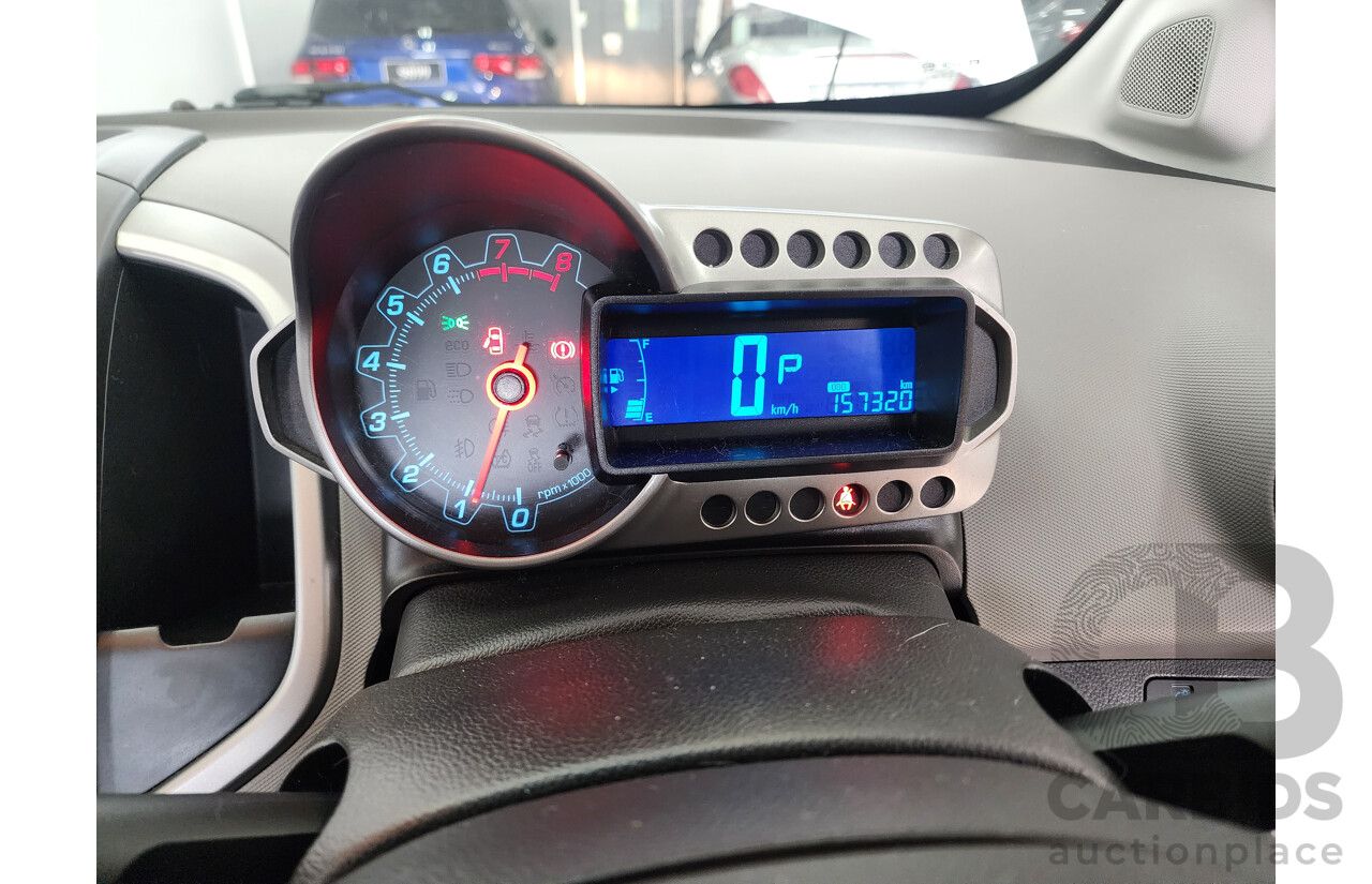 4/2013 Holden Barina CD TM MY13 5d Hatchback White 1.6L